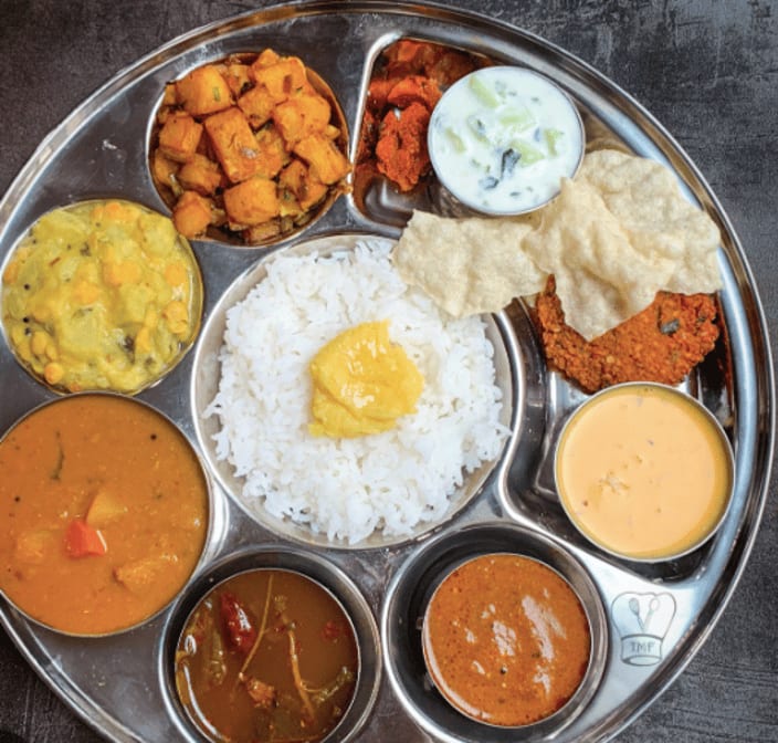 Butter Chicken Combo (Butter Chicken, Naan, Samosa, Rice, Dessert, Soda).
