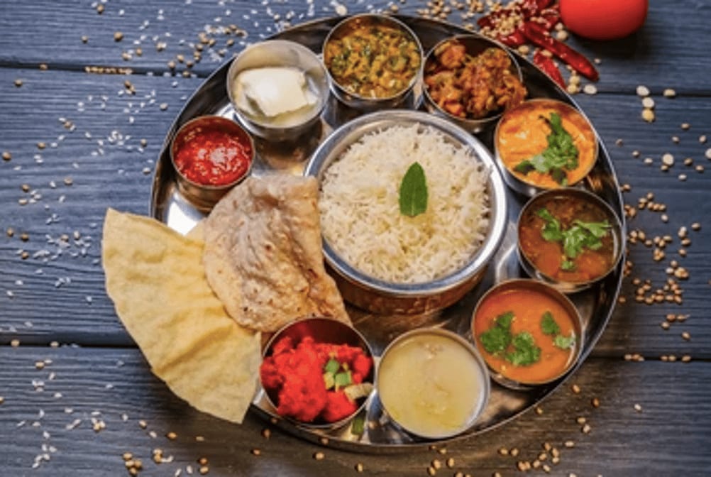 Chicken Tikka Masala Combo (Chicken Tikka Masala, Naan, Samosa, Rice, Dessert, Soda).